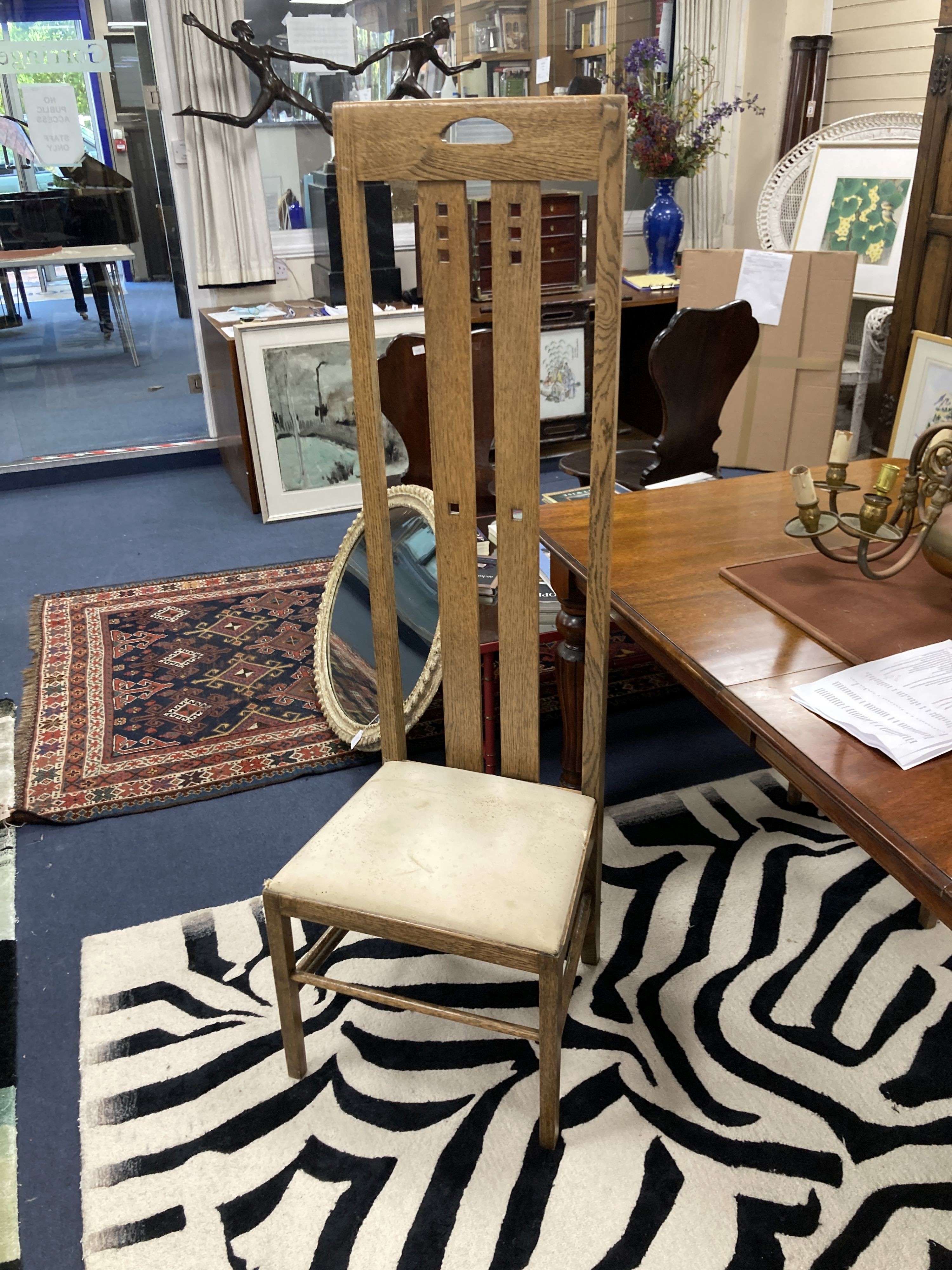 A set of six Macintosh style oak high back dining chairs. H-151cm.